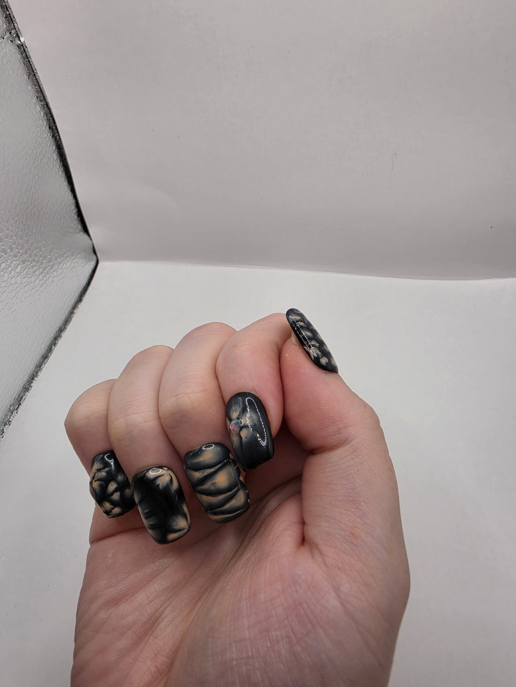 Black and petal pink nails