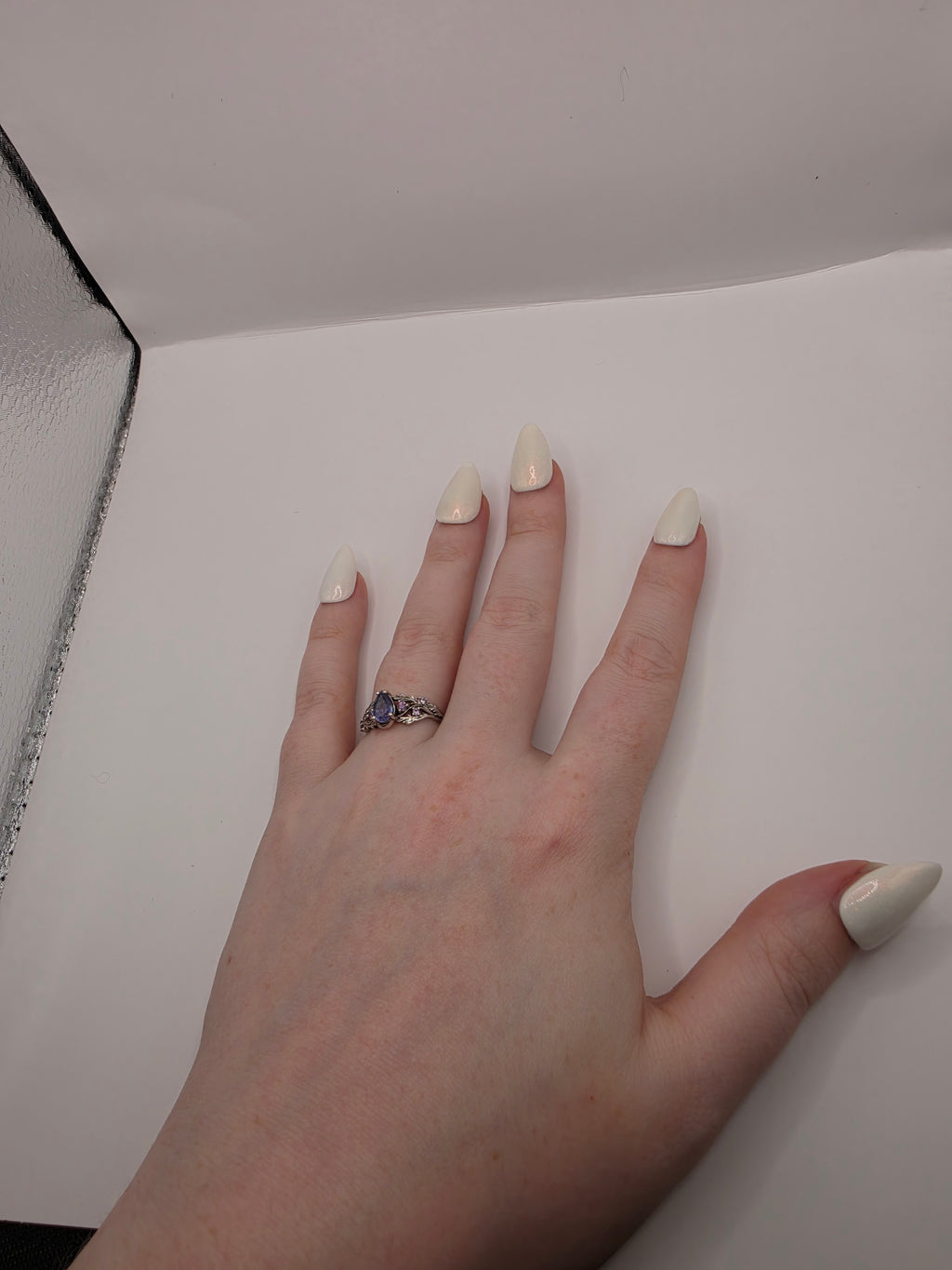 Sparkly white pearlescent nails