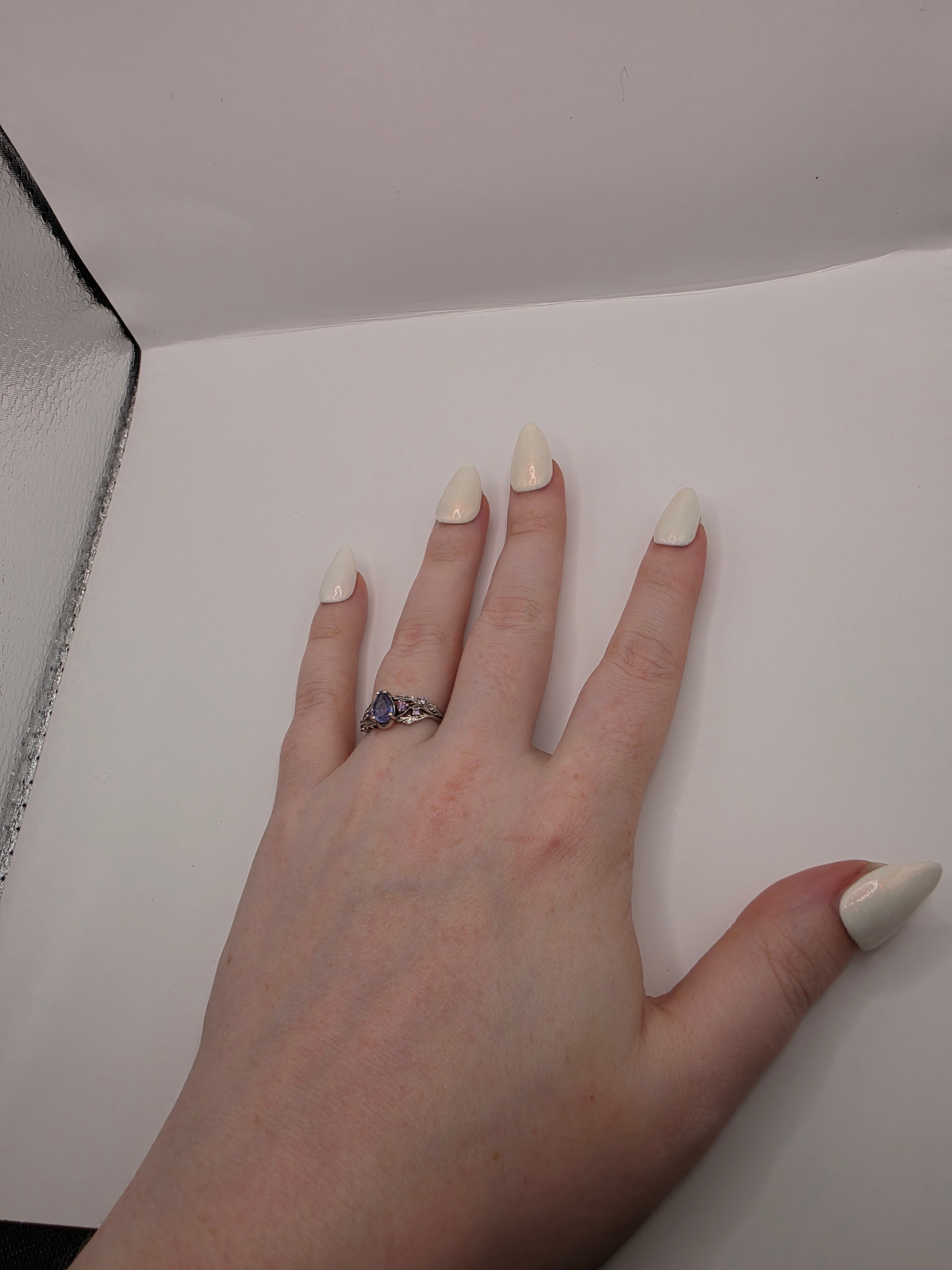 Sparkly white pearlescent nails