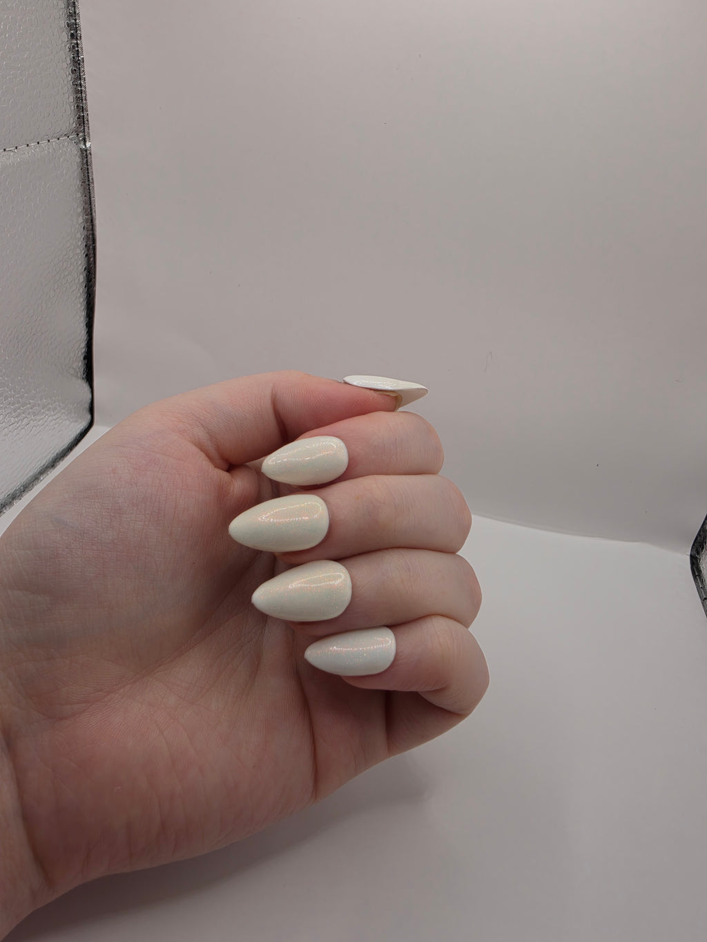 Sparkly white pearlescent nails
