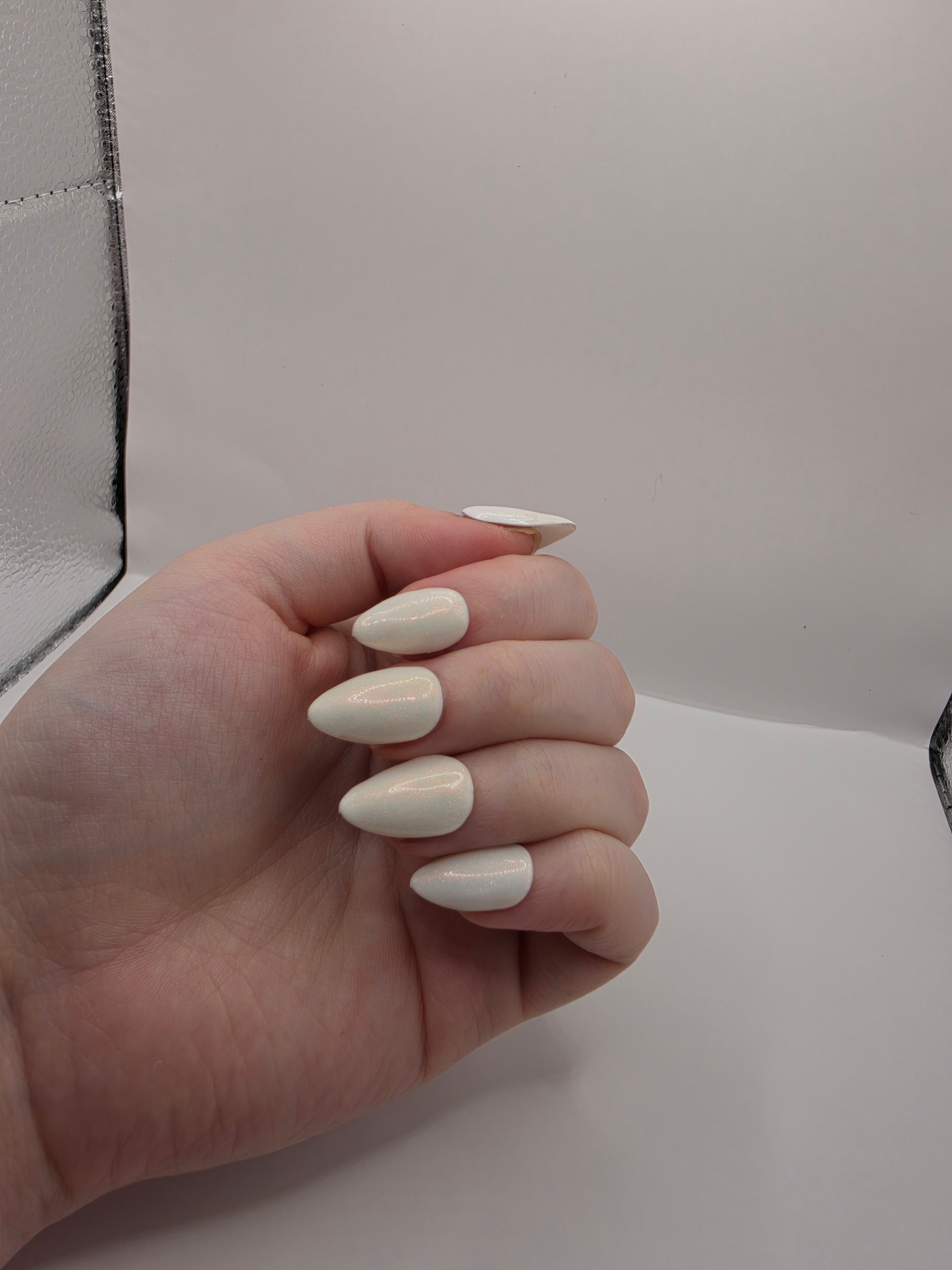 Sparkly white pearlescent nails