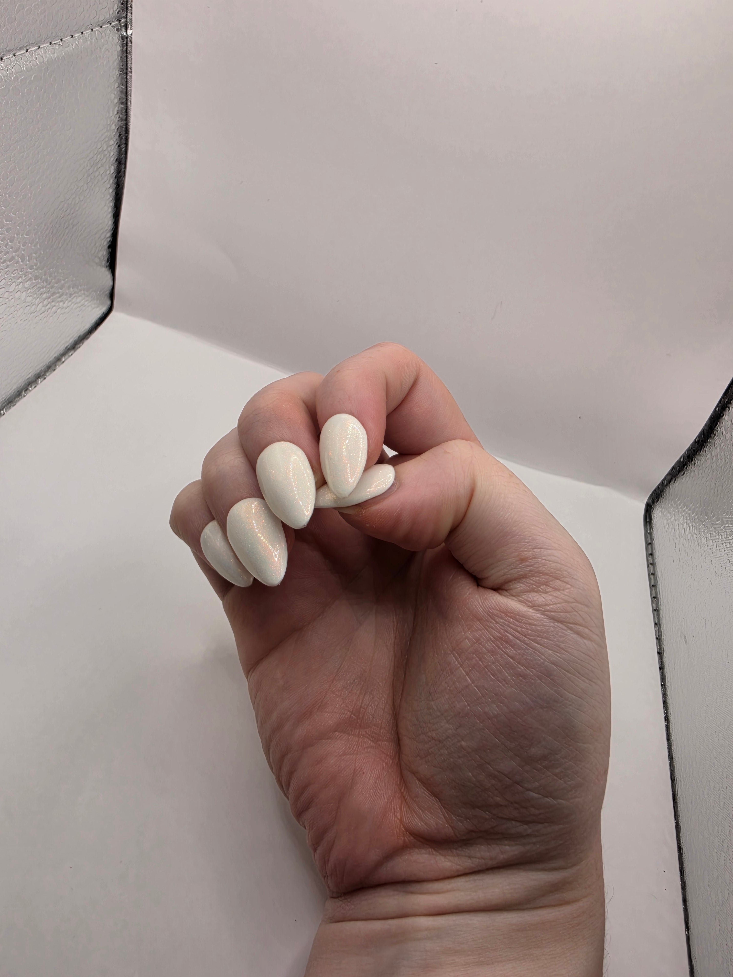 Sparkly white pearlescent nails