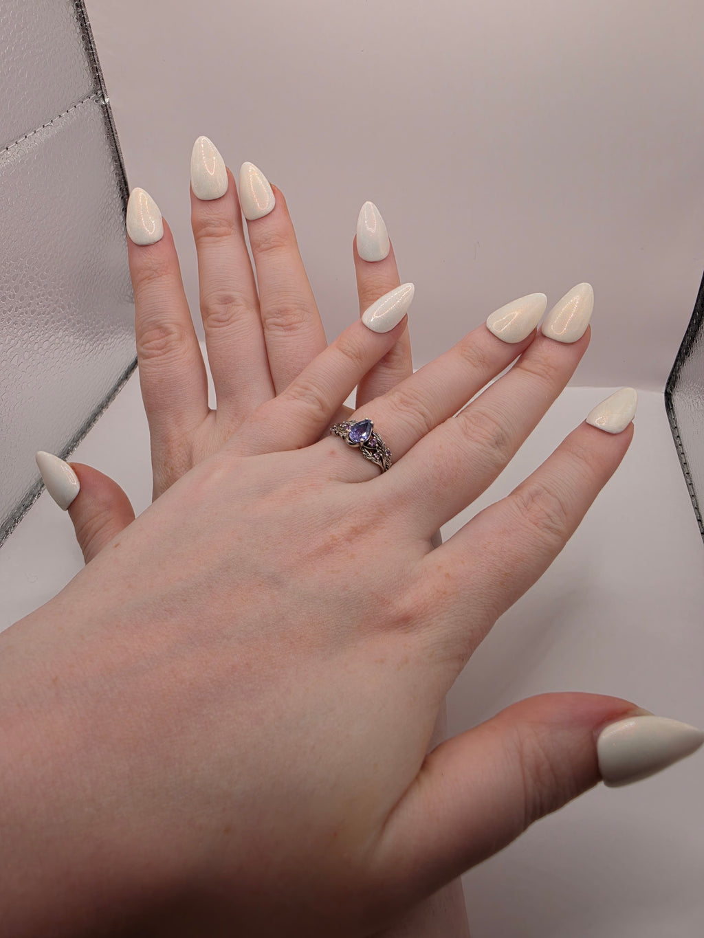 Sparkly white pearlescent nails
