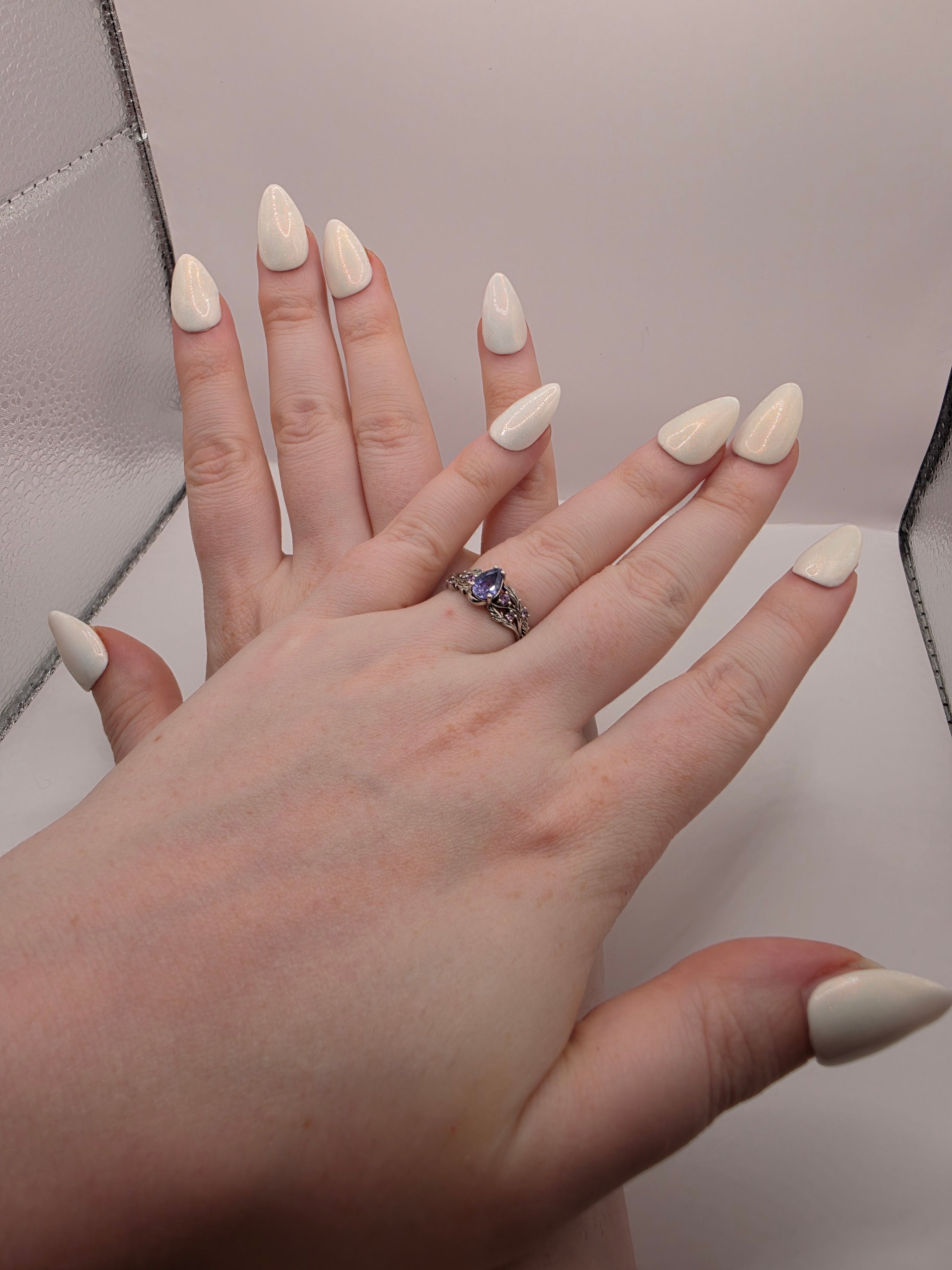 Sparkly white pearlescent nails