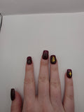 #158 Base Coat: A deliscous dark berry shade with brown undertones decorated with a butterfly design on the ring fingers and an elongated eight-pointed star charm inbedded into the pinky nails designed on short square nails